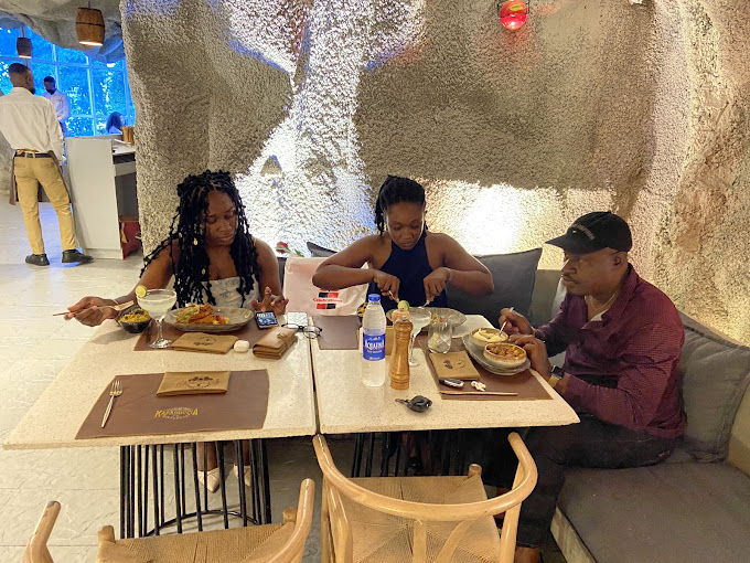 Guests dining inside the cave
